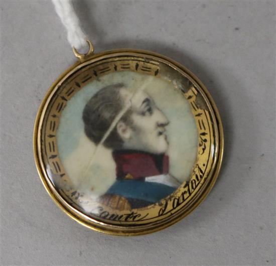 A late 18ct/early 19th century mourning pendant with bust of Comte dArtois and plaited hair en verso, 29mm.